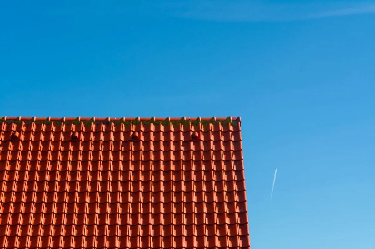 Tile roof gable in full sun, the kind of exposure that sets roof life in Warwick, RI